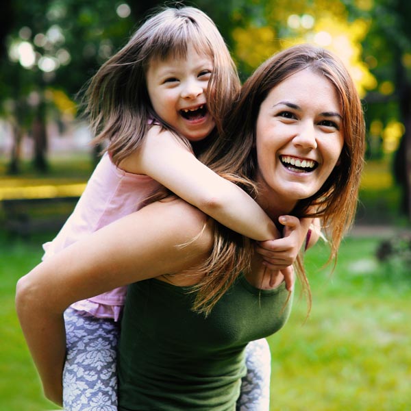 laughing mother and daughter